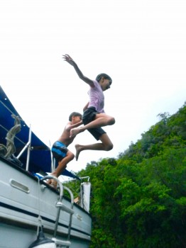 The kids finally starting to have a blast jumping off the boat.